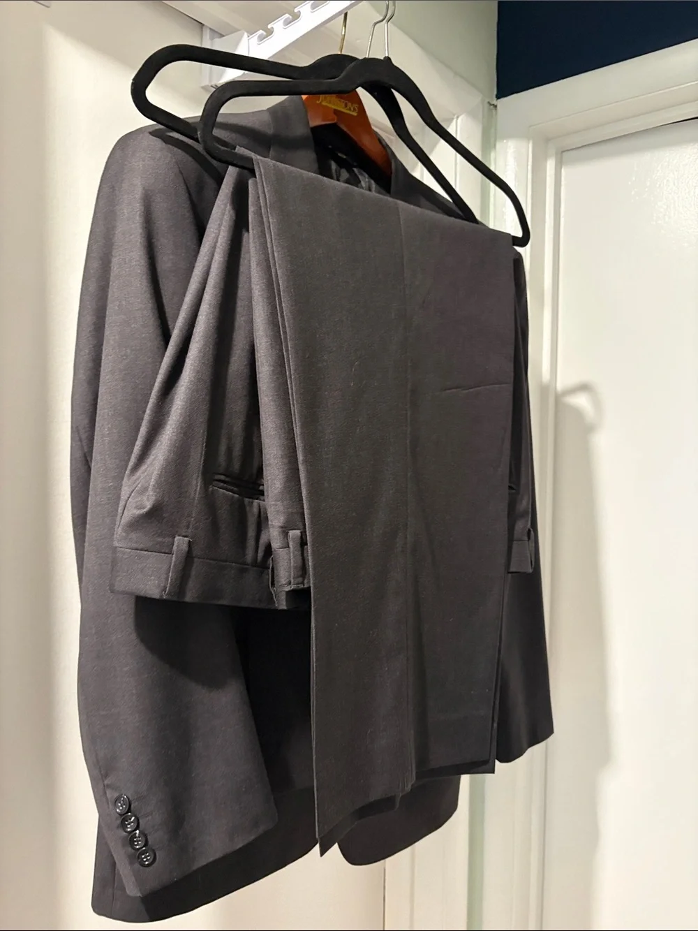 Classic Grey Two-Button Men's Suit with two pairs slacks.